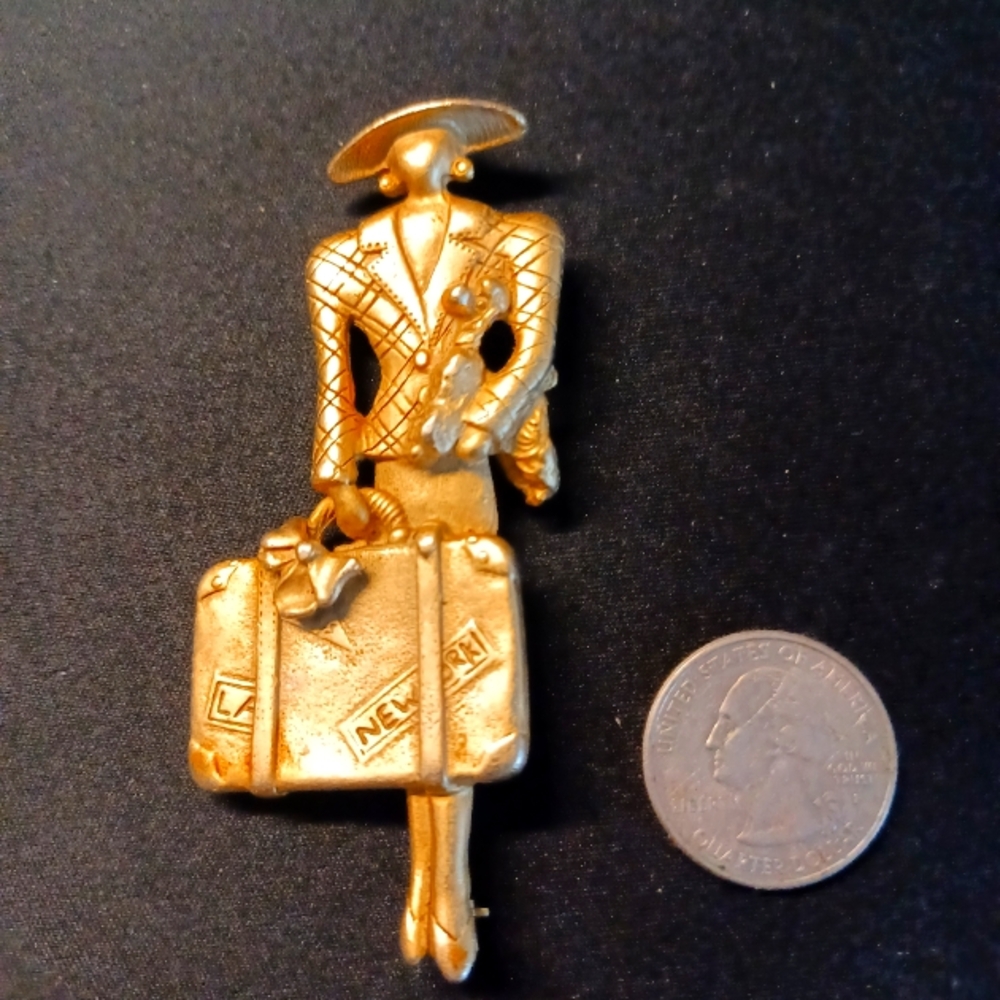 Chic Gold Woman Brooch with Suitcase